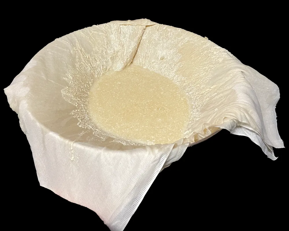 Straining an eighteenth-century milk punch recipe